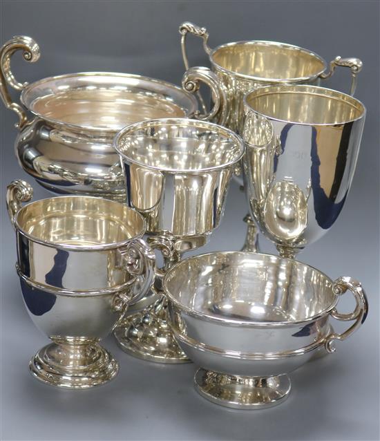 Six assorted silver trophy cups/goblets, 30.5 oz.